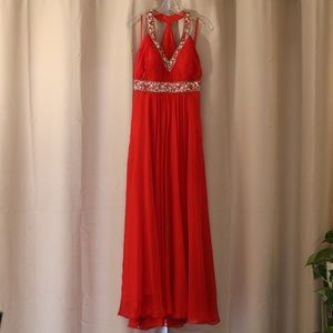 Red beaded prom dress by Night Moves Prom Collection